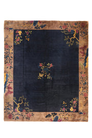 Vintage Chinese Art Deco rug, 114x97 inches (290x247 cm), featuring a deep navy field adorned with delicate floral sprays and a taupe border embellished with blossom vines and scenic vignettes.