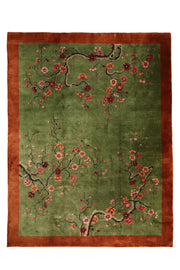 Antique Chinese decorative rug, 138x104 inches, featuring vibrant green and orange hues with intricate patterns.