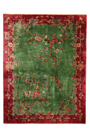 Antique Chinese decorative rug, 138x106 inches, featuring vibrant green and magenta tones with intricate patterns.