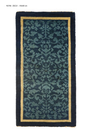 1920s Chinese Art Deco rug, 59x31 inches (150x80 cm), featuring a delicate sky blue scrolling pattern on a denim background, framed by an elegant gold border.